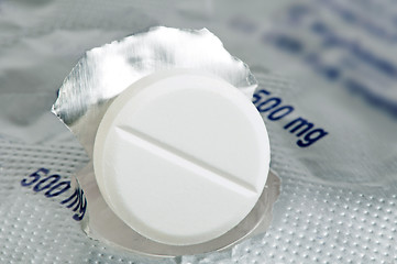 Image showing White pill in a pack very close up