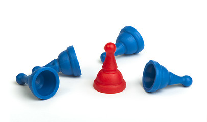 Image showing Red and blue game pawns white isolated