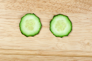 Image showing Two cucumber slices