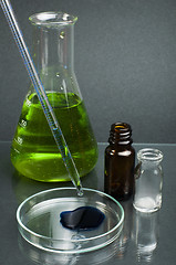 Image showing Laboratory beaker filled with green color liquid substances