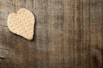 Image showing Heart shape cookie on wooden background