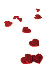 Image showing Red shiny hearts on white background