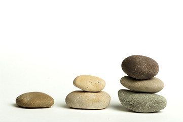 Image showing Stacked stones white isolated