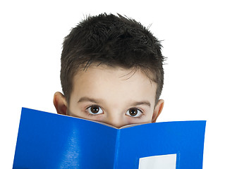 Image showing Child with notebook in front of the face