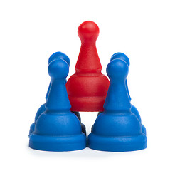 Image showing Red and blue game pawns white isolated