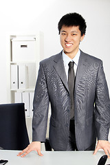 Image showing Asian business man standing