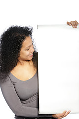 Image showing Smiling woman with banner