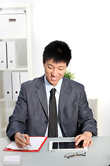 Image showing Smiling Asian business man