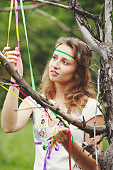 Image showing Beautiful girl with ribbons