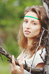 Image showing Beautiful girl with ribbons