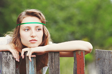 Image showing Beautiful girl with ribbons