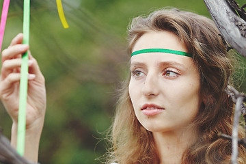 Image showing Beautiful girl with ribbons