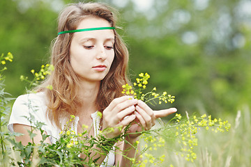 Image showing Beautiful girl with ribbons