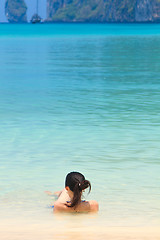 Image showing Young womand relaxing at the beach