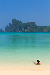 Image showing Young womand relaxing at the beach