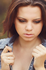 Image showing Beautiful Girl on pine-wood