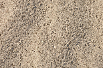 Image showing Tracks of rain on sand