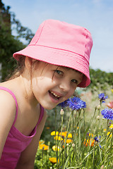Image showing A little girl in a meadow