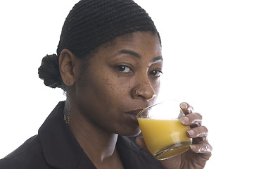 Image showing woman drinking orange juice