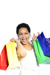 Image showing Laughing woman with colourful shopping bags