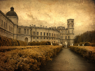 Image showing Old classic palace with statues near main entrance  in grunge and retro style. Retro card. Vintage backgraund.