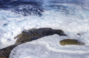 Image showing ocean waves crashing on rocks