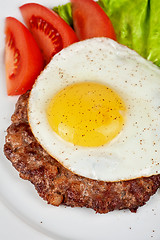 Image showing steak beef meat with fried egg