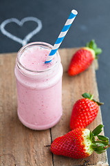 Image showing Strawberry smoothie and heart drawing