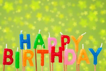 Image showing Birthday candles on blurry background 