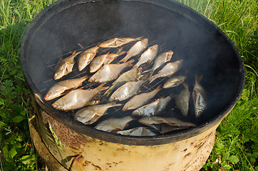 Image showing ecologic fish smoke smoke house rusty barrel 