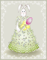 Image showing Easter card.  Illustration of an easter rabbit with egg. Illustr