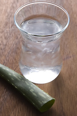 Image showing aloe vera juice with fresh leaves