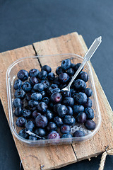 Image showing Fresh blueberries and fork