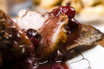 Image showing Delicious Scrambled Grilled meat with cranberry sauce 