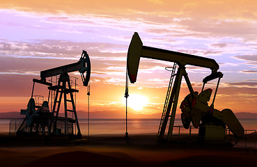 Image showing oil pumps on sunset