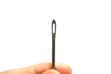 Image showing Hand holding a Sewing needle