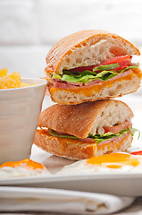 Image showing ciabatta panini sandwich eggs tomato lettuce