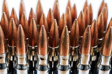 Image showing chain of bullets over white, closeup