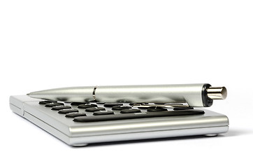 Image showing A calculator and a pen on a white background