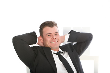 Image showing Relaxed confident smiling businessman