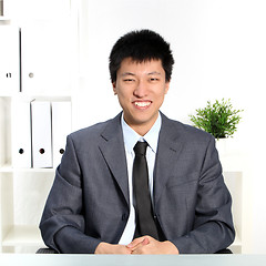 Image showing Confident happy young Asian businessman