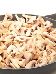 Image showing Frying Pan with the sliced Champignons