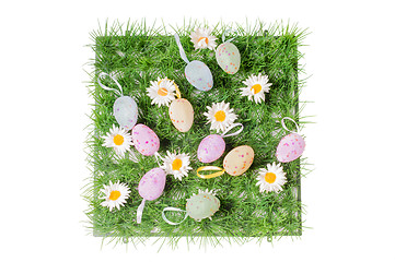 Image showing Easter eggs on the grass