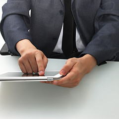 Image showing Man using a tablet computer