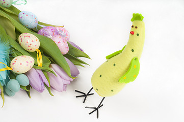 Image showing Easter chicken with tulips and eggs