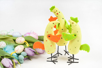 Image showing Easter chicken family with tulips and eggs