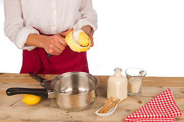Image showing Peeling lemon