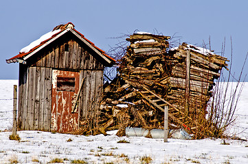 Image showing Old cabin in snow