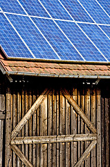 Image showing Solar panel on old barn