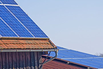 Image showing Solar panel on old barn